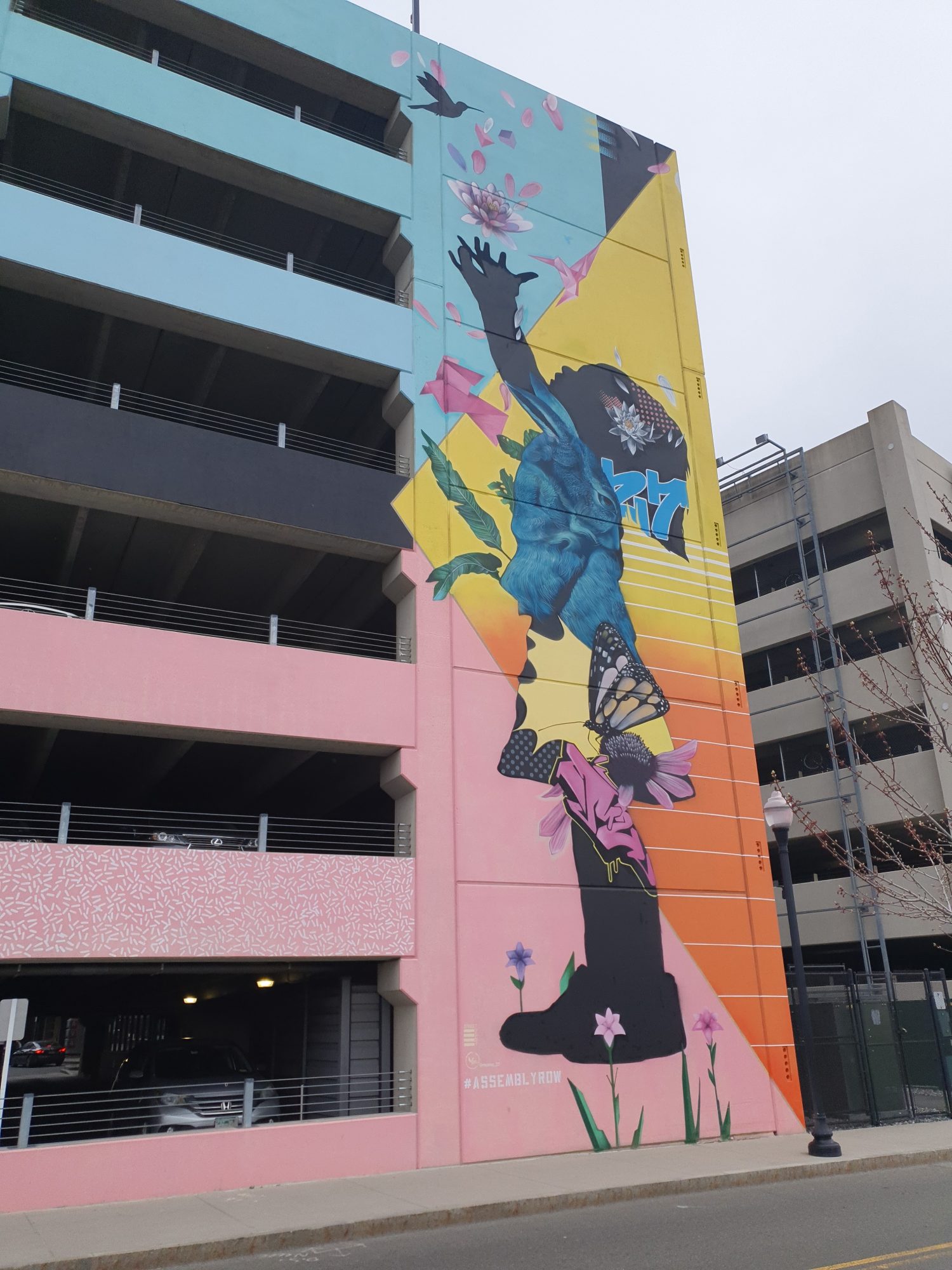 Dynamic Jumping Figure Multicolor Mural — Street art by Marka27 in Boston