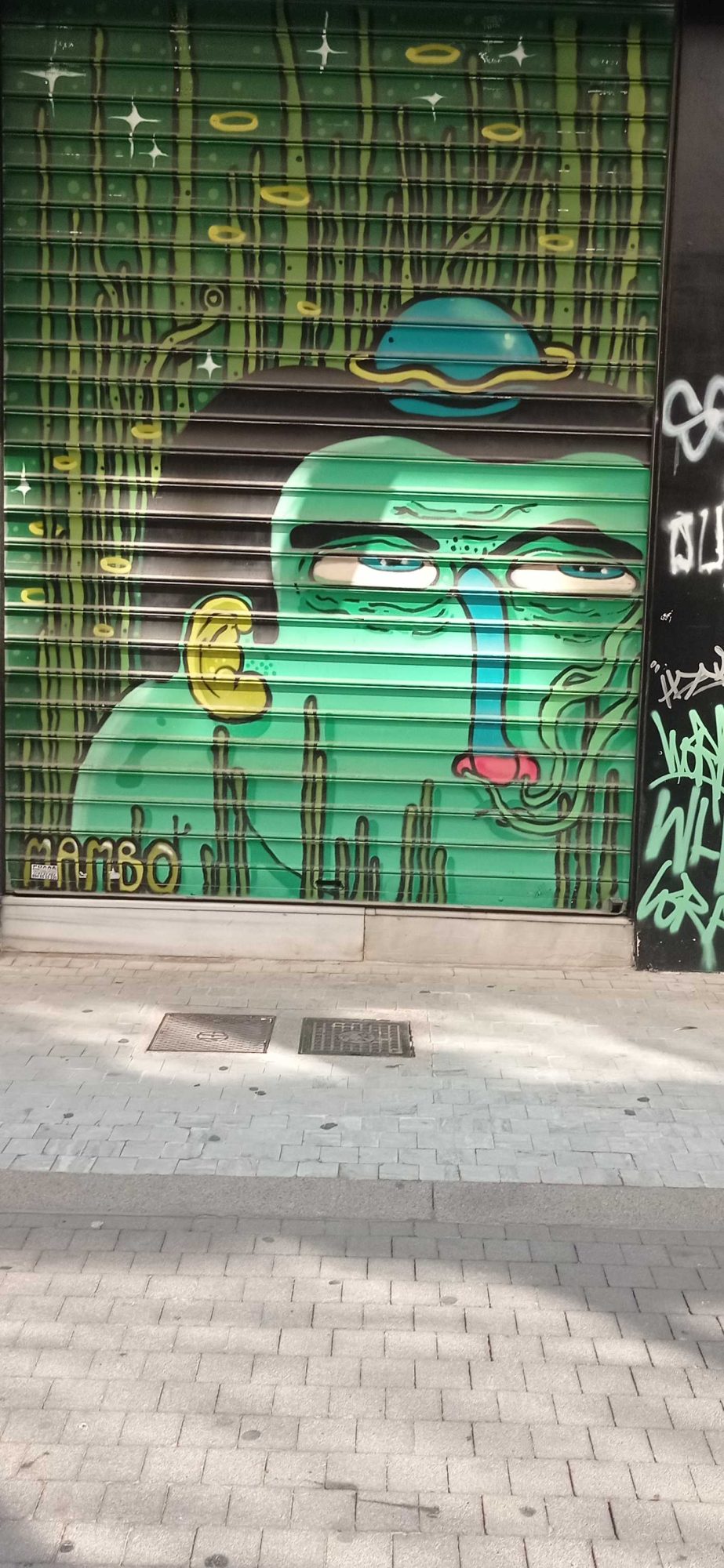 Manbo Green Alien with Space Sombrero — Street art in Athina