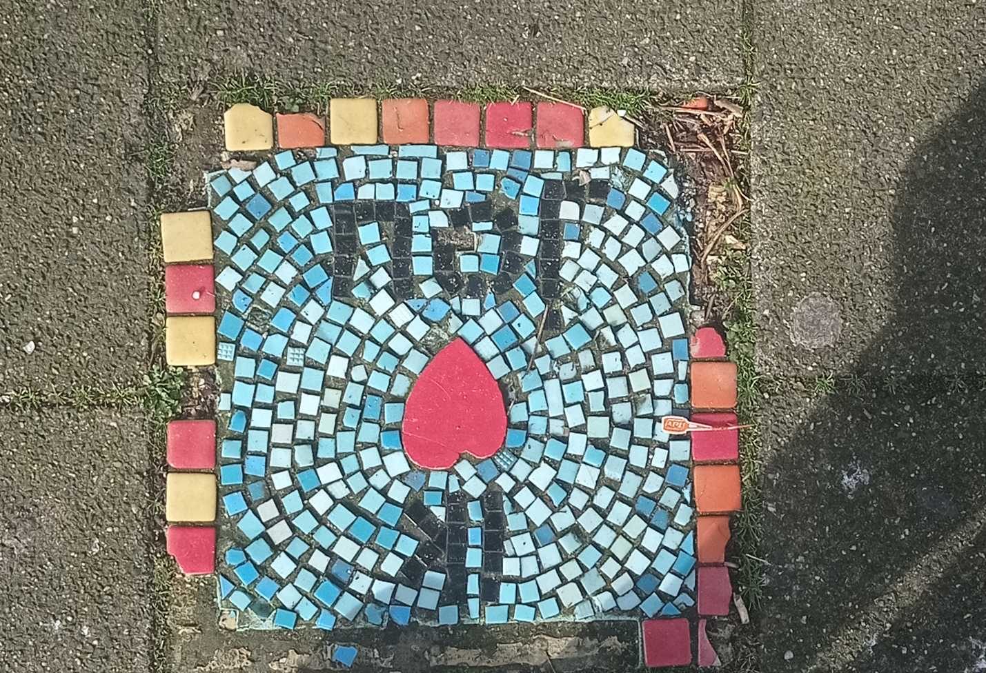 Red Heart in a Pavement Mosaic — Street art in Rotterdam