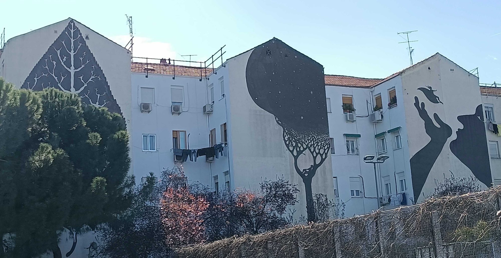 Les ombres de Sam3 sur les medianeras d'Antonio López — Street art de Sam3 à Madrid