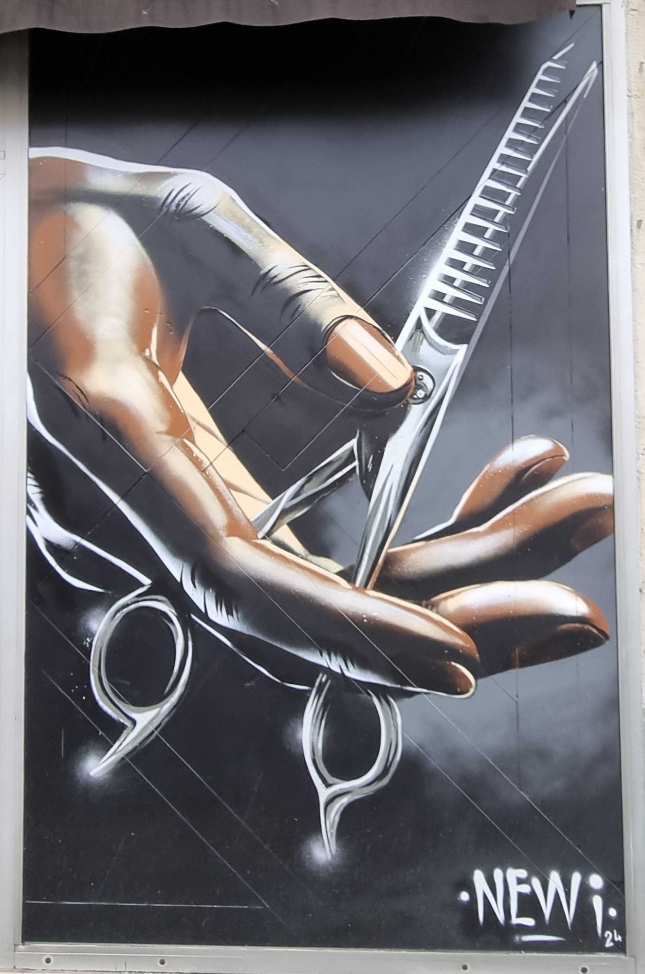 Hands Holding Scissors by Newi — Street art by Newi (Julien Berland) in Clermont-Ferrand