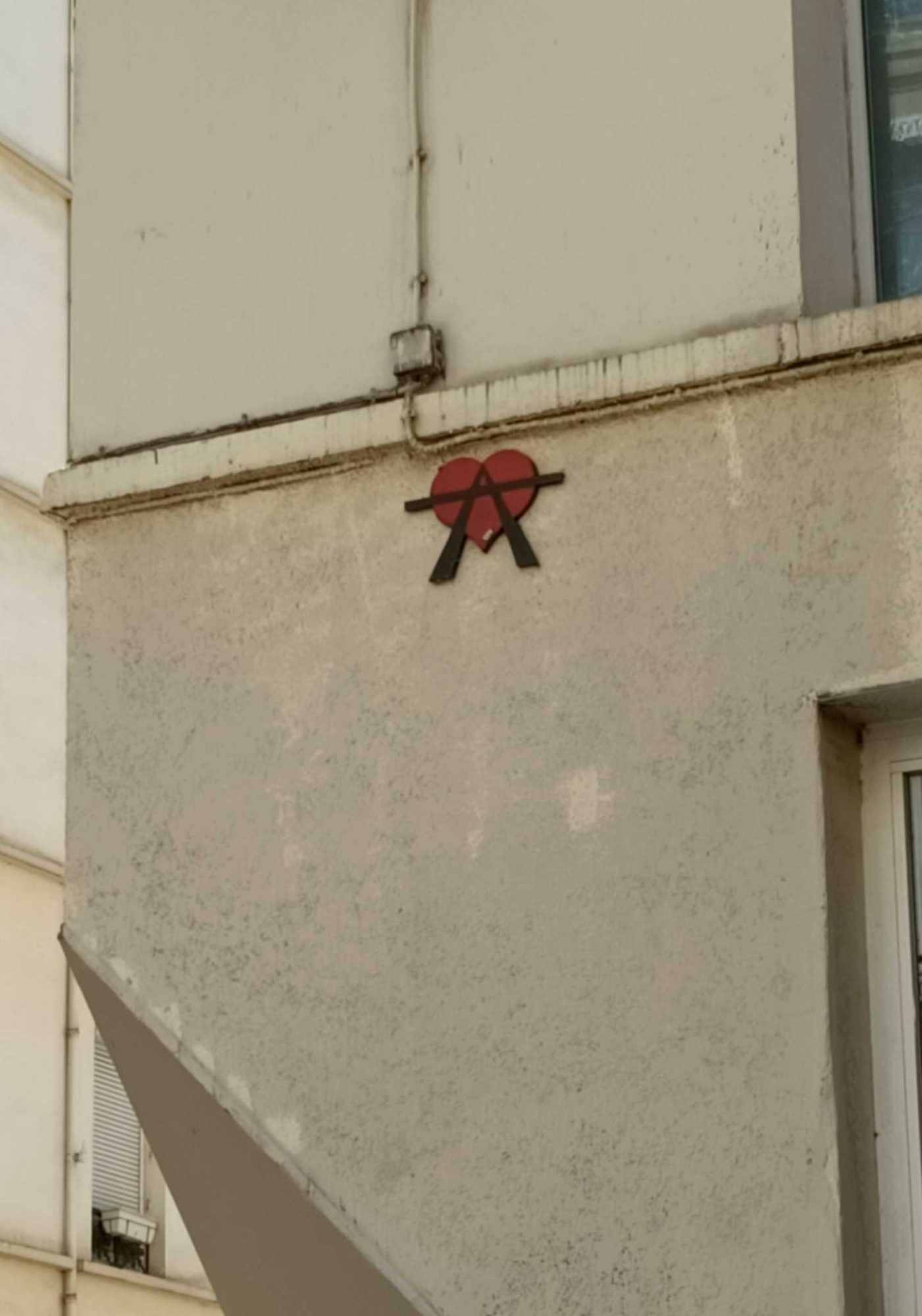 A2 Red Sticker Paris — Street art by A2 in Paris