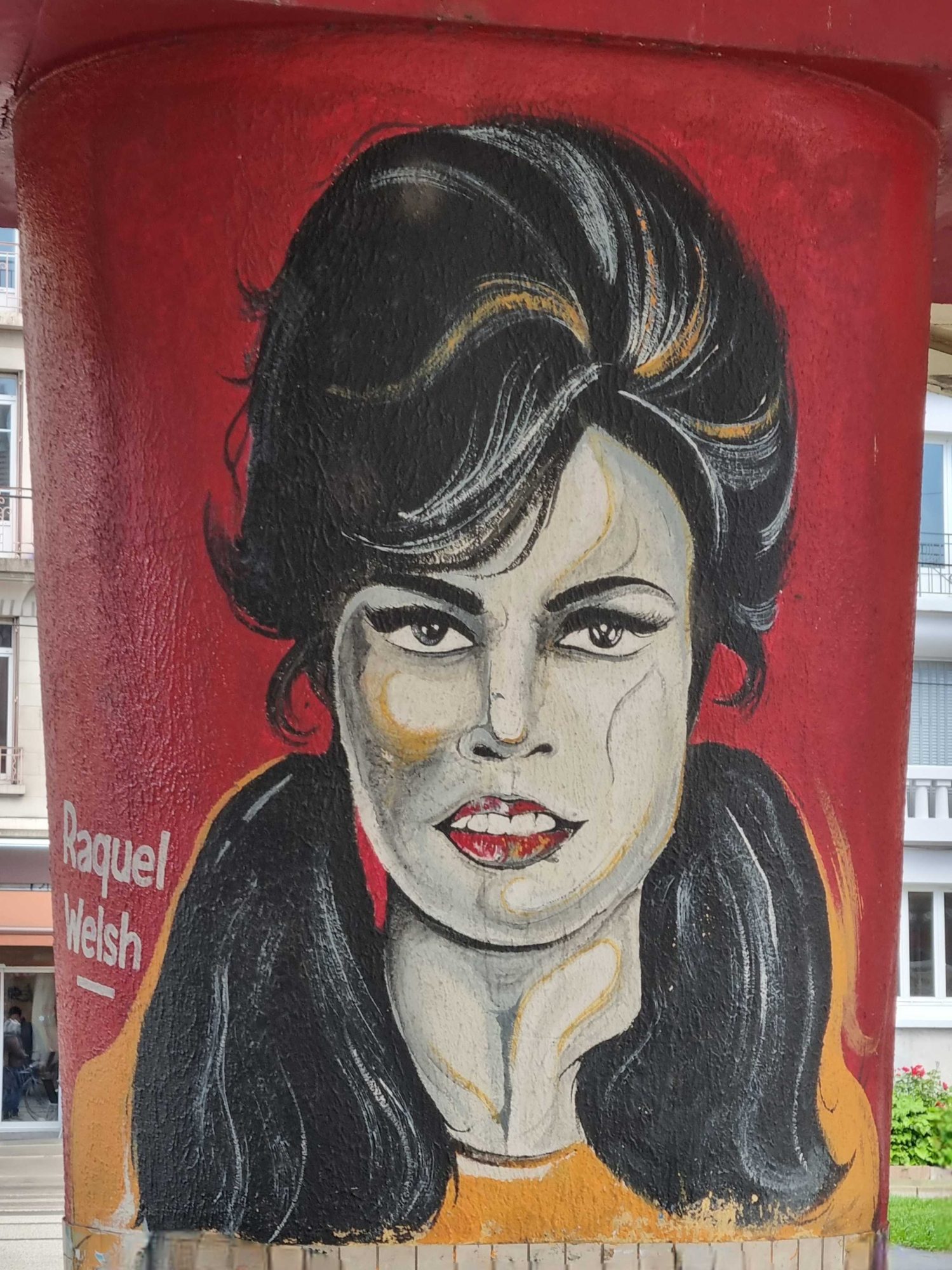 Portrait of Raquel Welch on Pillar — Street art in Grenoble