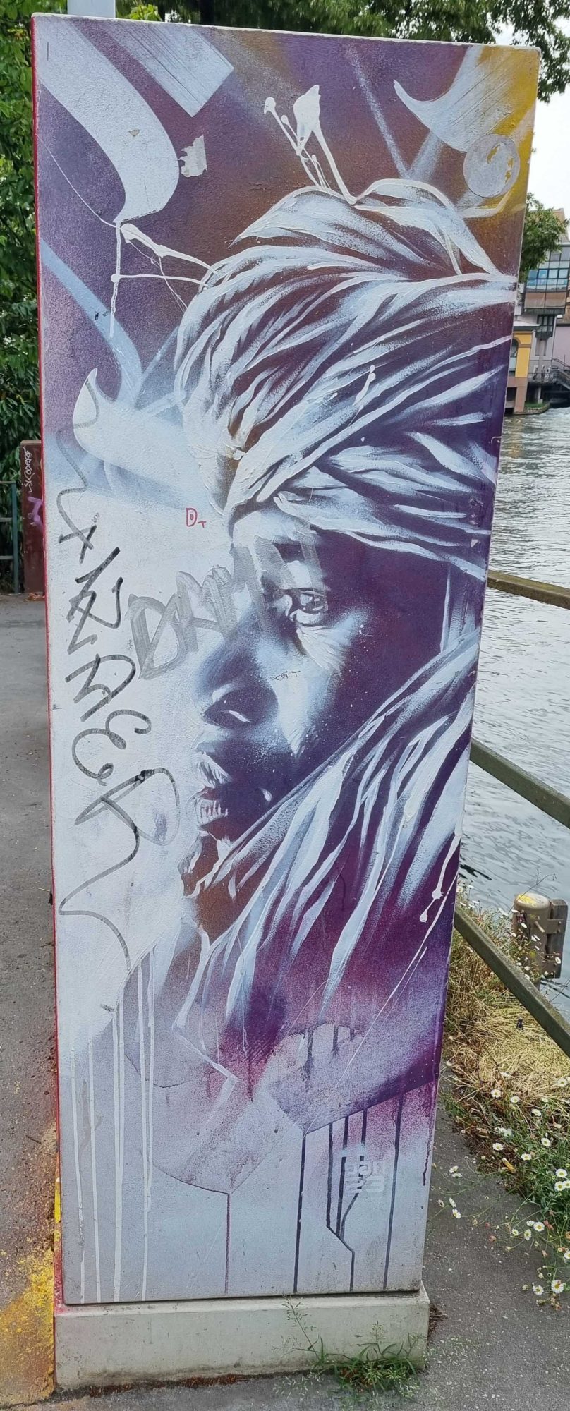 The Face in the White Turban — Street art by Dan23 in Strasbourg