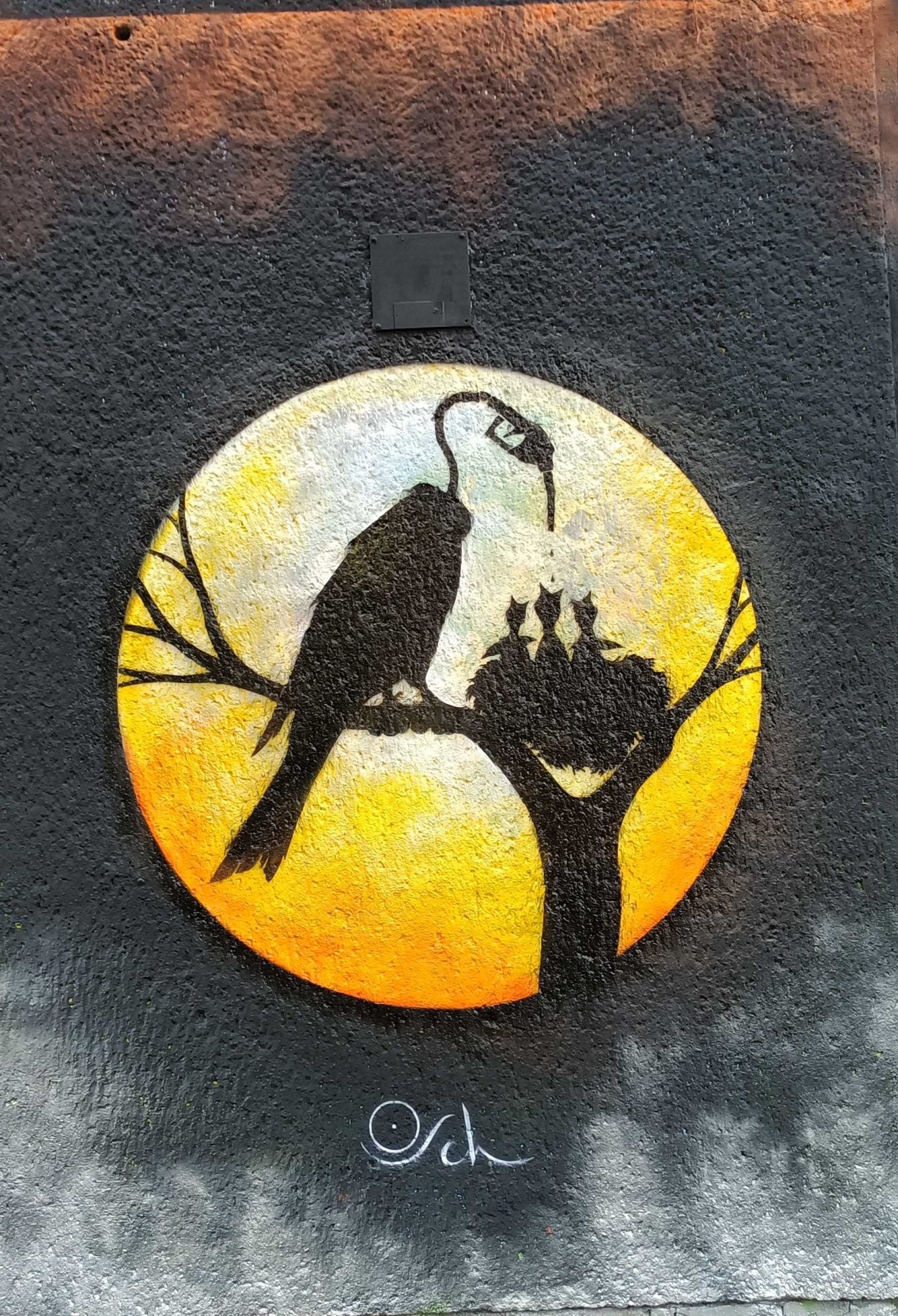 Bird Feeding with Fuel Pump Beak — Street art in Berlin
