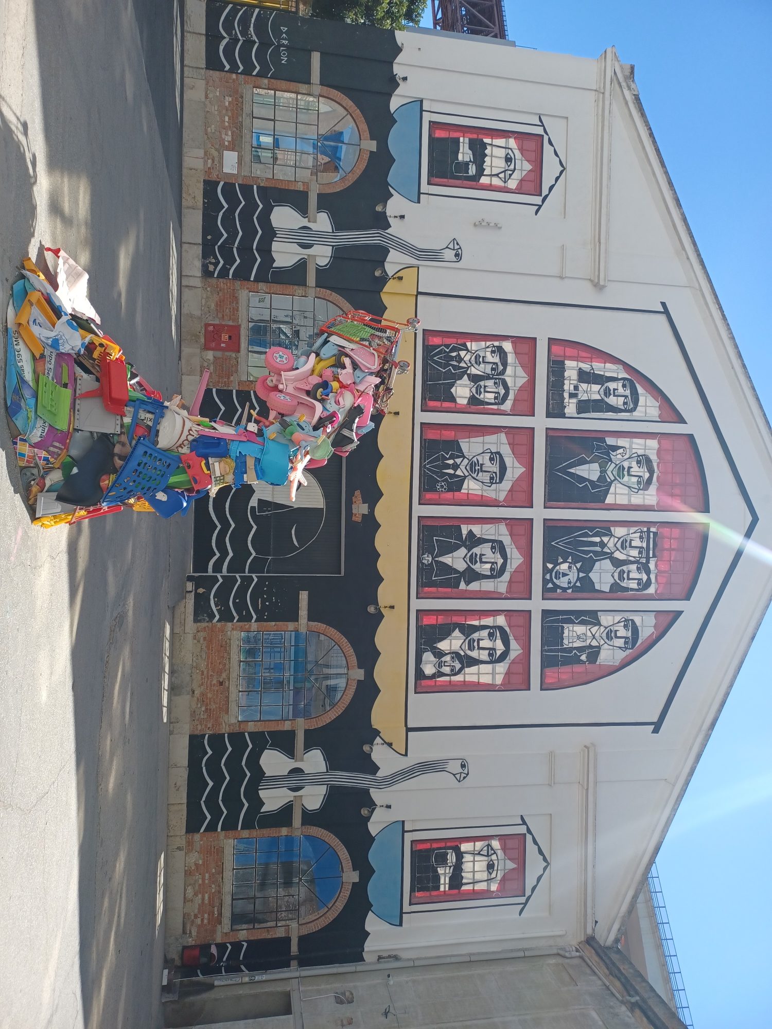 Neo-Gothic Mural with Colorful Figures in Lisbon — Street art in Lisboa