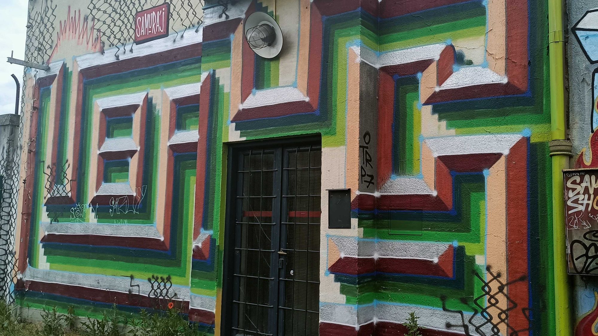 Geometric Trompe-L'oeil Colored Facade — Street art in Prague