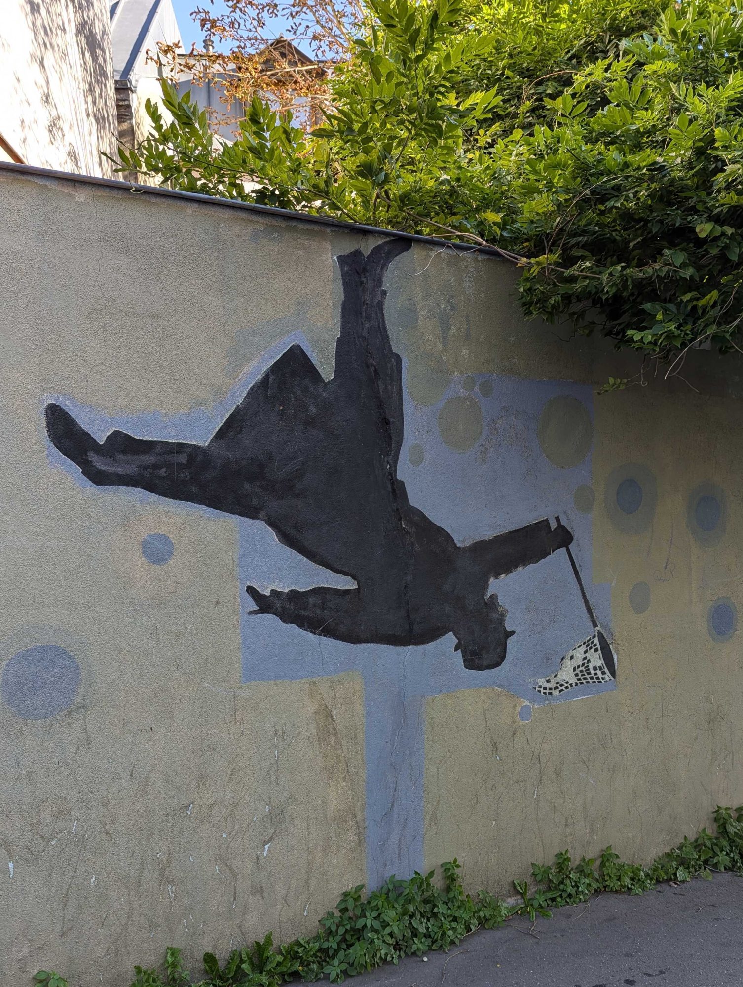 The falling silhouette — Street art in Paris