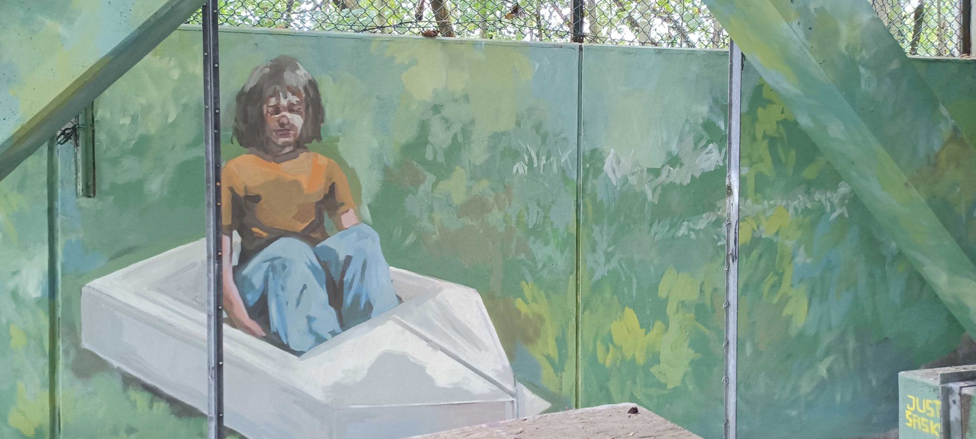 Woman on White Bed Introspective — Street art in Berlin