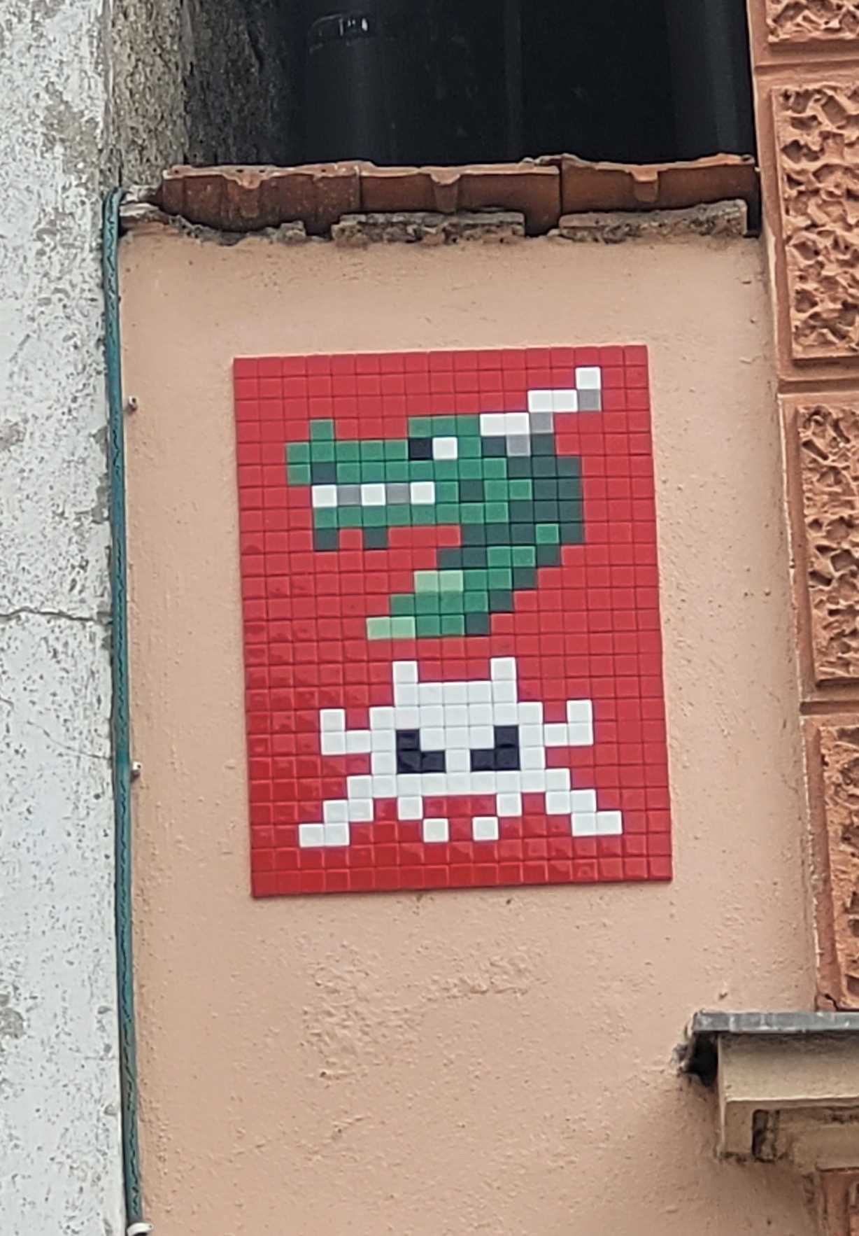 LJU_32, Dragon and Skull on Red — Street art by Invader in Ljubljana