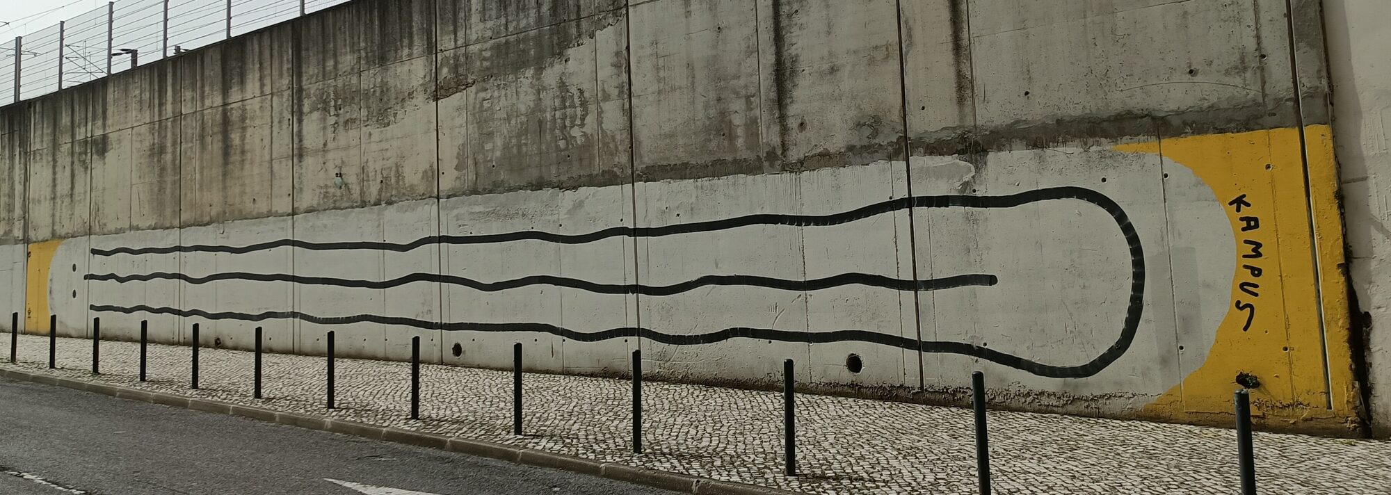 Giant sausage — Street art by Kampus in Lisboa