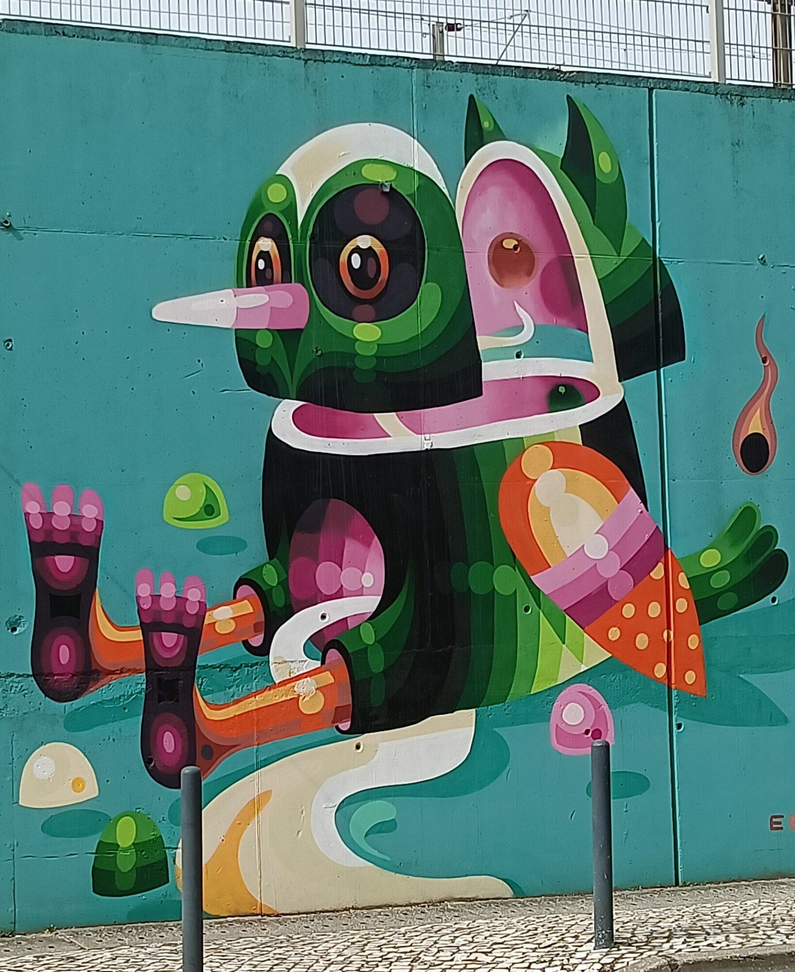 Green and Pink Creature with Multiple Eyes — Street art by I Am Eelco in Lisboa