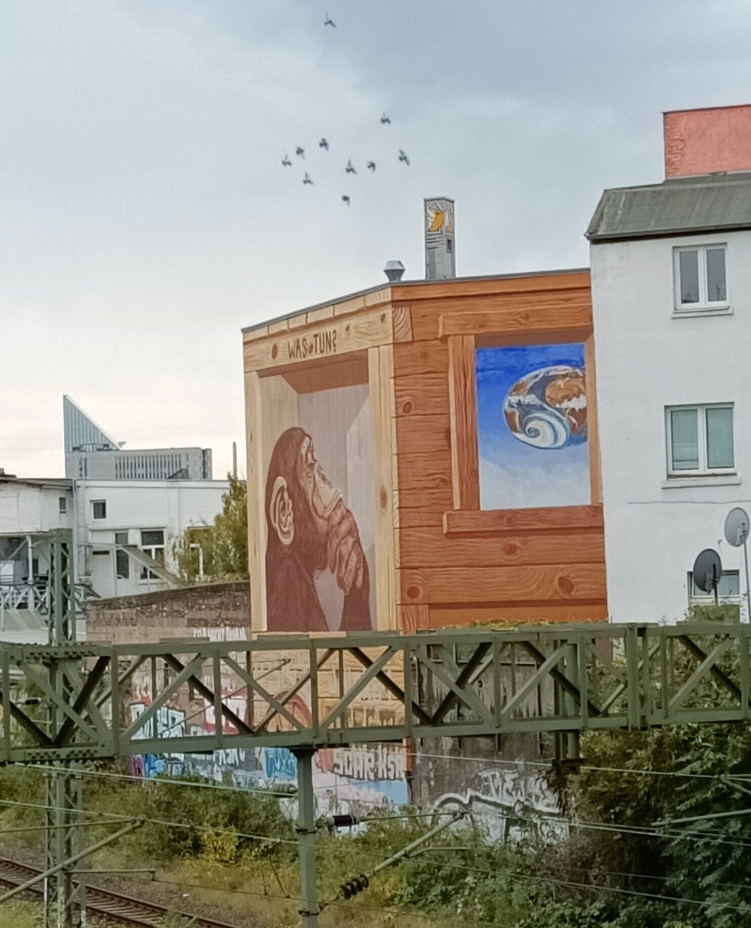 Was tun ? par Klaus Klinger — Street art de Klaus Klinger à Düsseldorf
