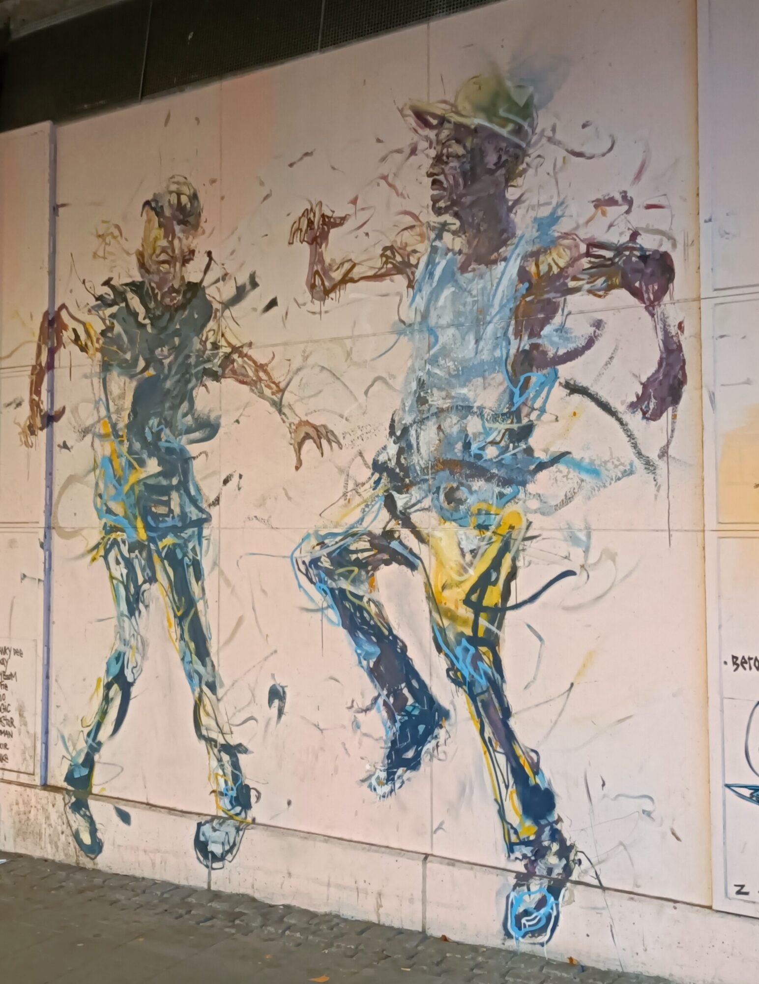 Two dancers in liquid gesture — Street art by Bust The Drip in Düsseldorf