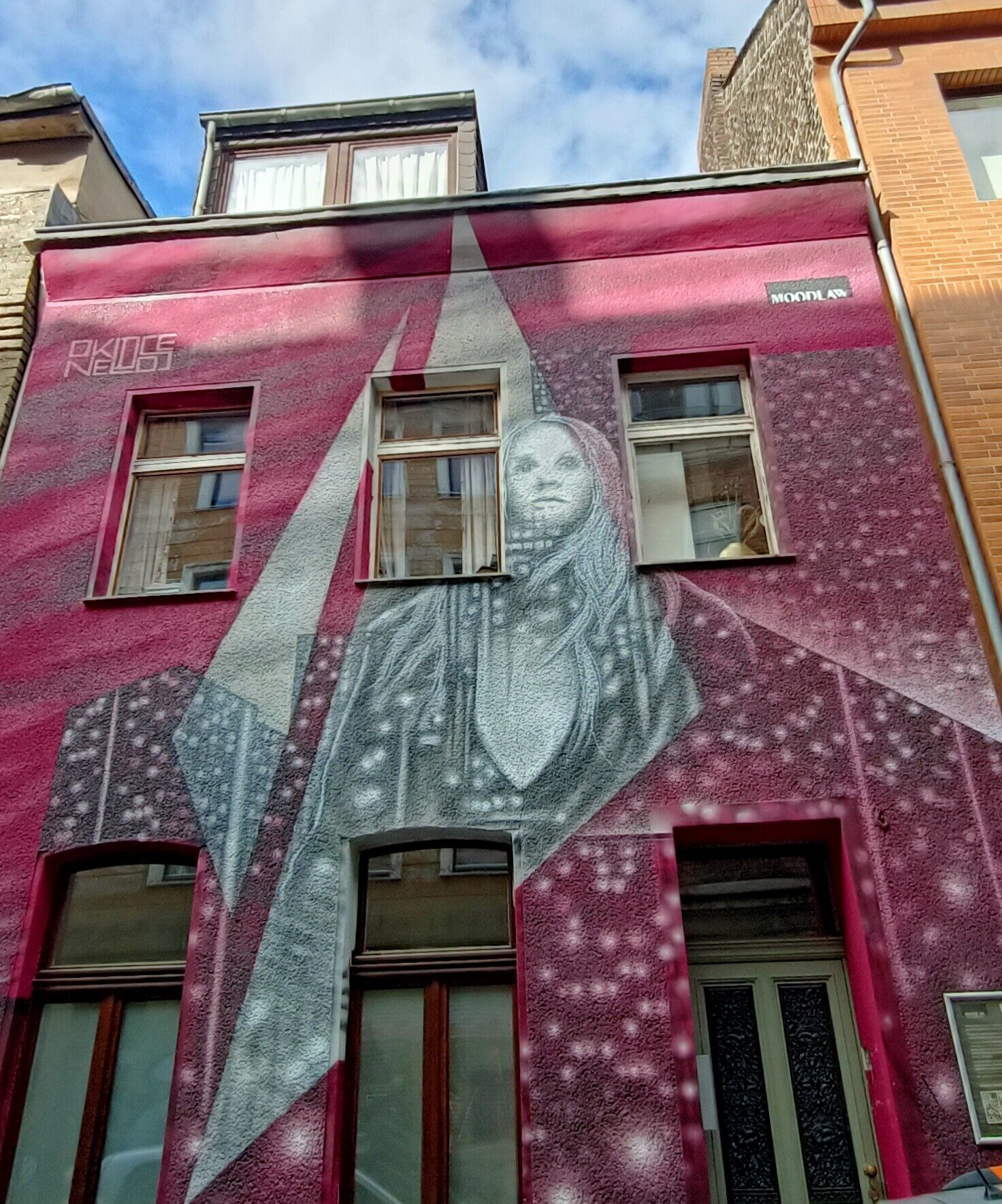 Woman and lightning bolt by Onkel Dose — Street art by Onkel Dose in Köln