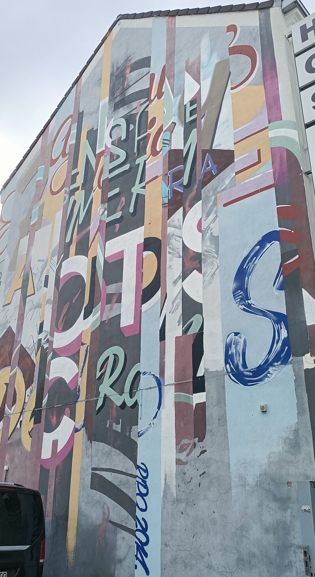 Mural calligraphy by Rakaposhii — Street art by Rakaposhii in Köln