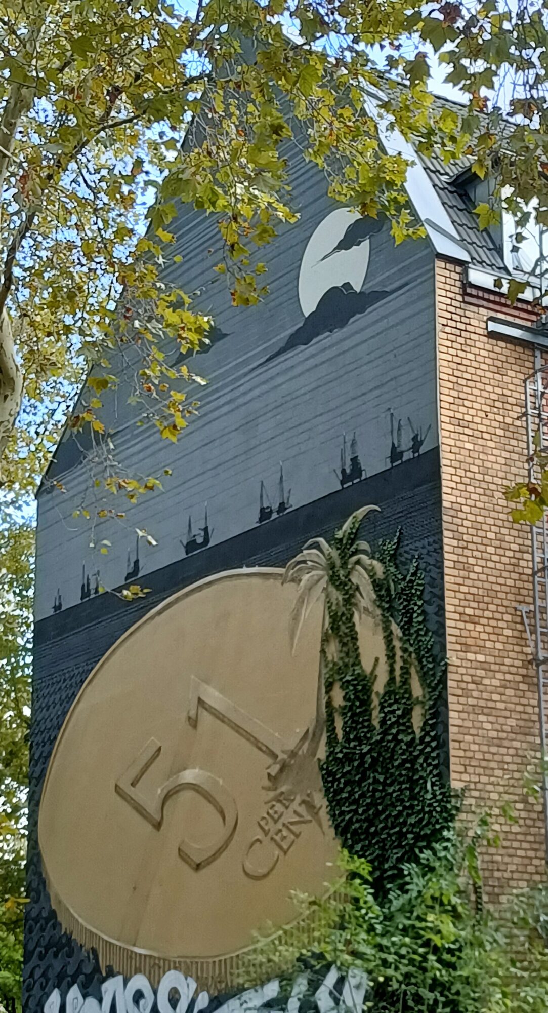 51 perCent, the gold coin — Street art by Captain Borderline in Köln