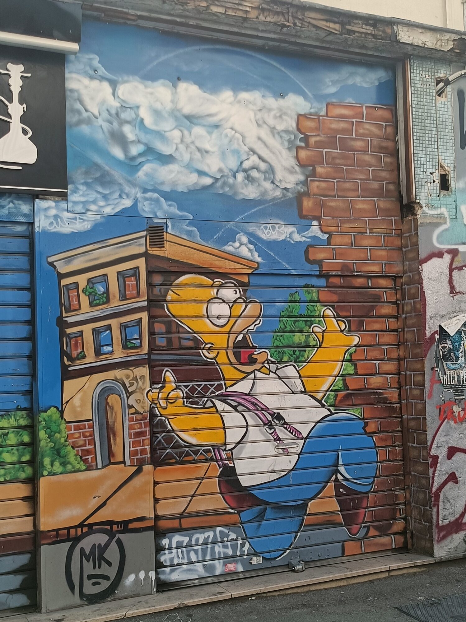 Homer Simpson mid-run — Street art in Marseille