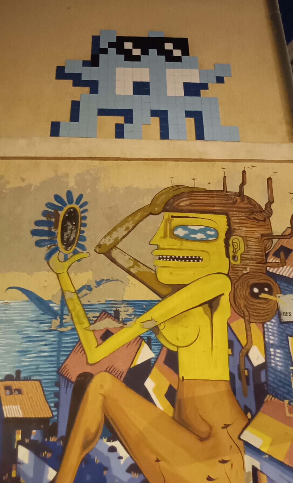 Blue Alien on Place des Augustines — Street art by Invader in Marseille
