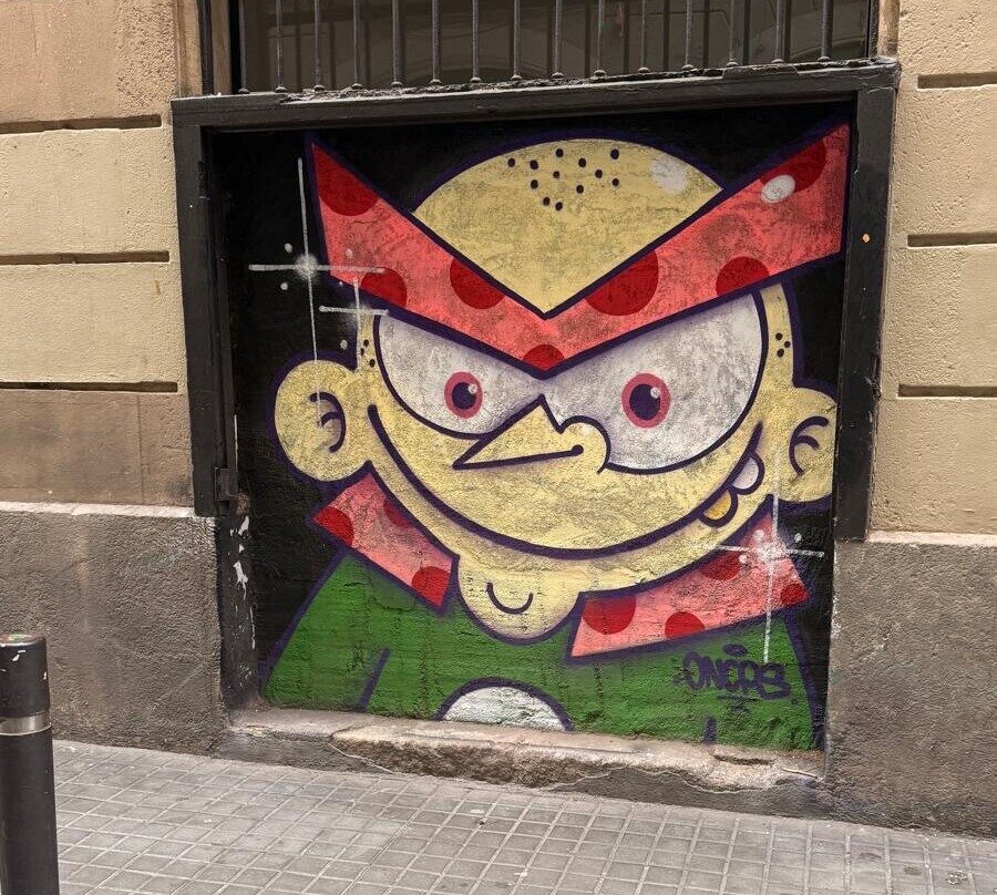 Elf in a Polka-Dot Cap — Street art in Barcelona