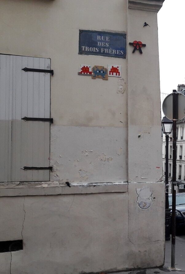 PA_66, Red Space Invader on Rue des Trois-Frères — Street art by Invader in Paris