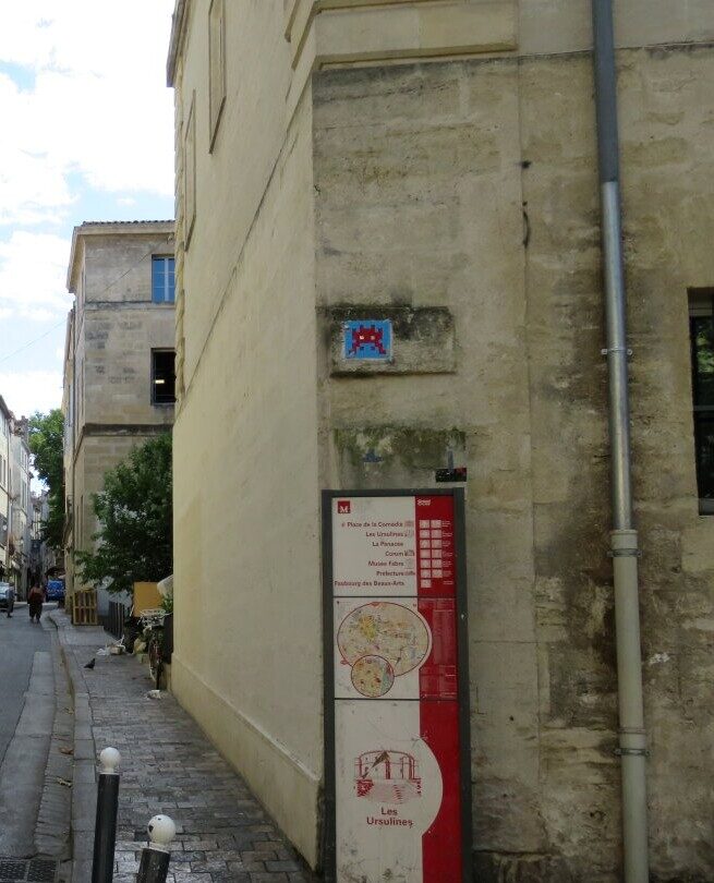 MPL_25, Space Invader on Rue des Écoles Laïques — Street art by Invader in Montpellier