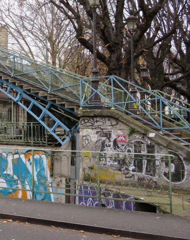 PA_19, Space Invader on Passerelle Arletty — Street art by Invader in Paris