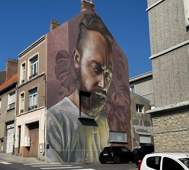 Portrait barbu aux feuilles de monstera — Street art de Smug à Boulogne-sur-Mer