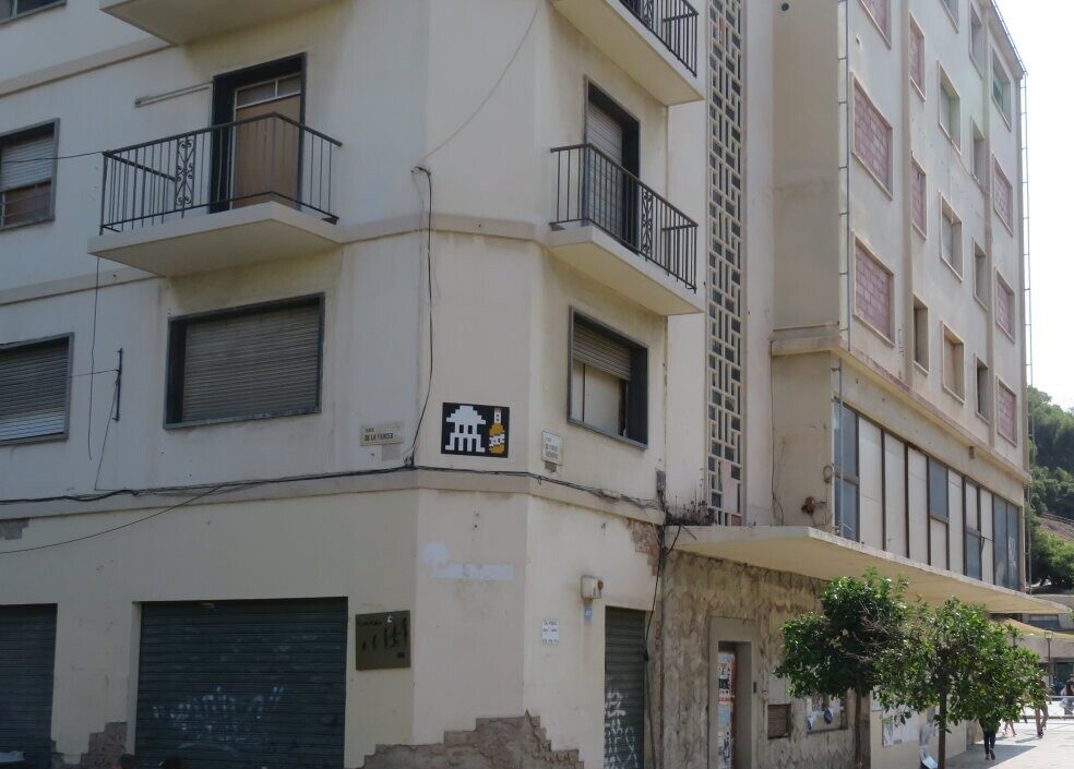 MLGA_27, Space Invader on Plaza de la Merced — Street art by Invader in Málaga
