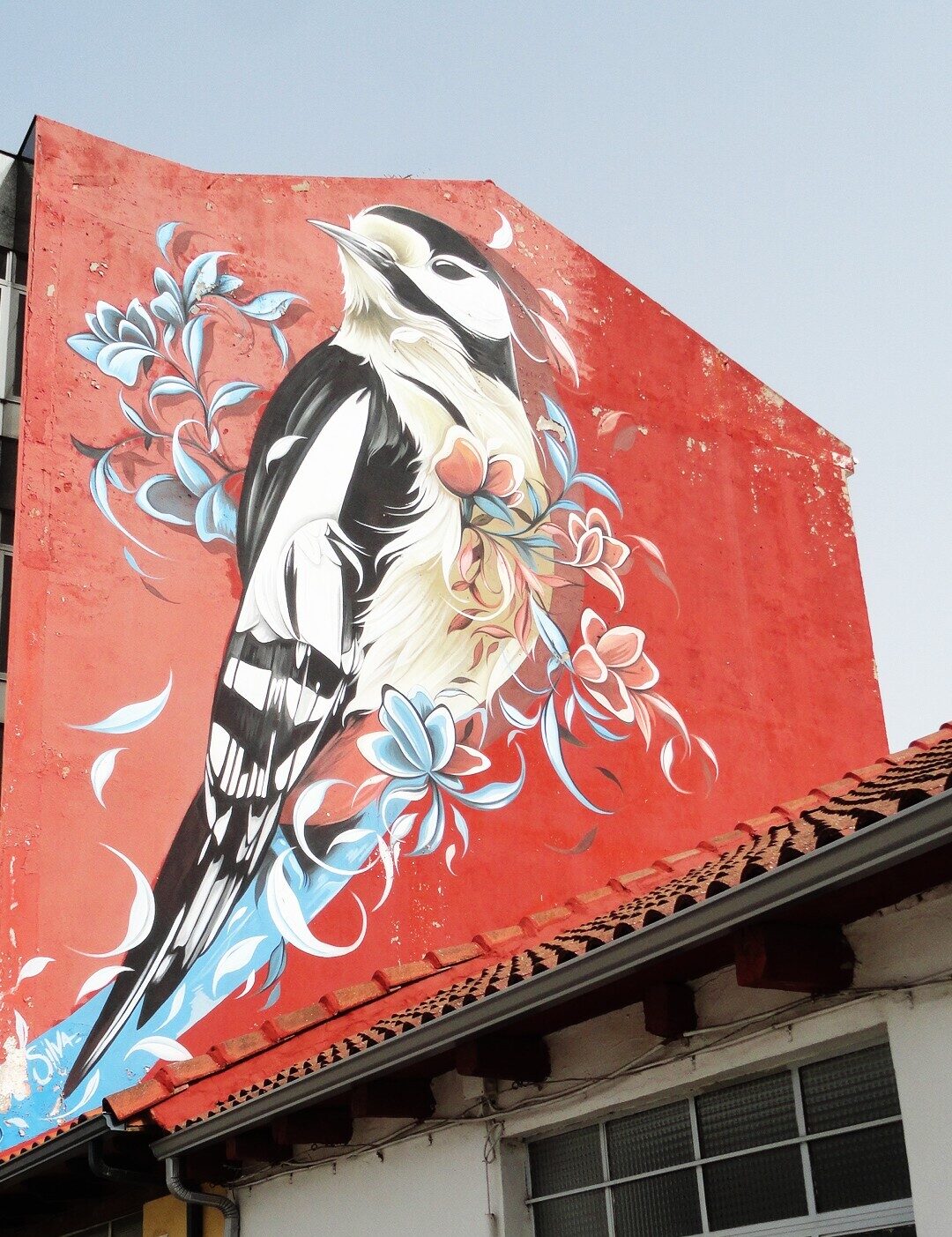 Woodpecker — Street art by Fio Silva in La Bañeza