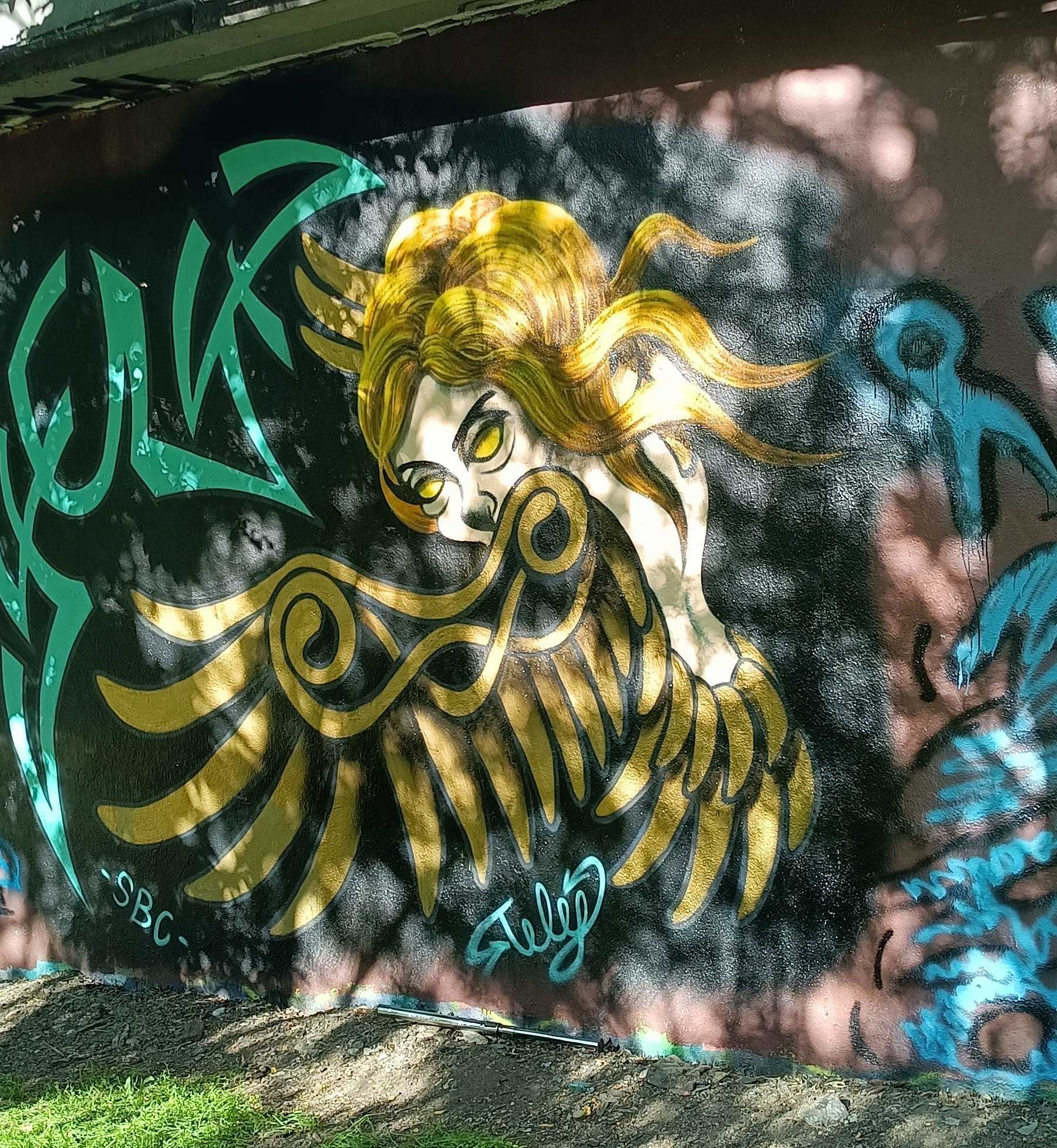 Golden Winged Goddess — Street art in Prague