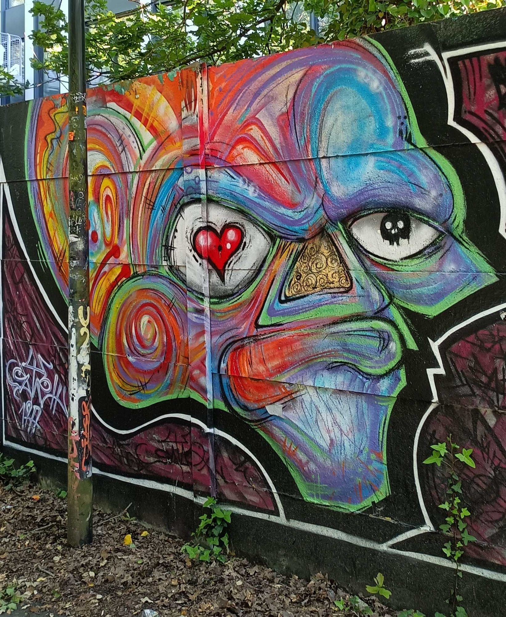 The Face with a Heart and a Skull — Street art in Nantes
