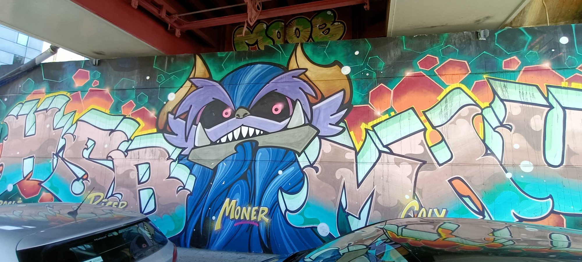 Blue Monster Surrounded by Letters by Moner — Street art by Moner in Nantes