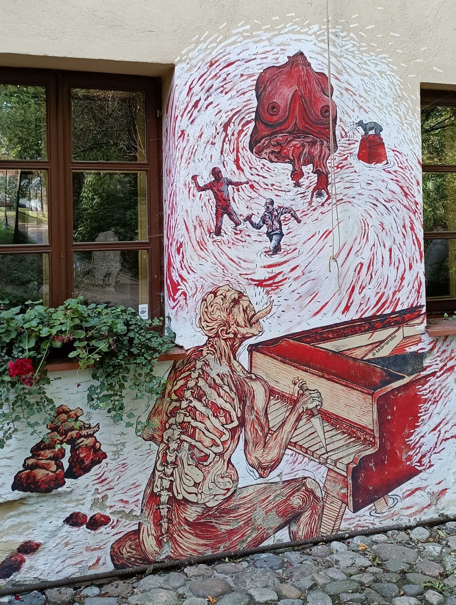 The Flayed Pianist — Street art in Vilnius