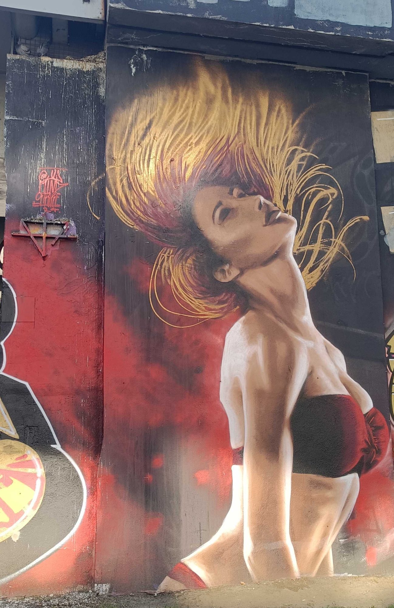 Cheveux au Vent — Street art de JW Mind Strike à Prague