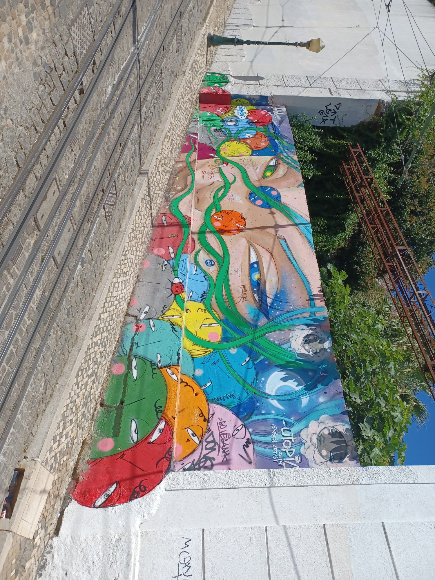Colorful Characters on Wall in Lisbon — Street art in Lisboa