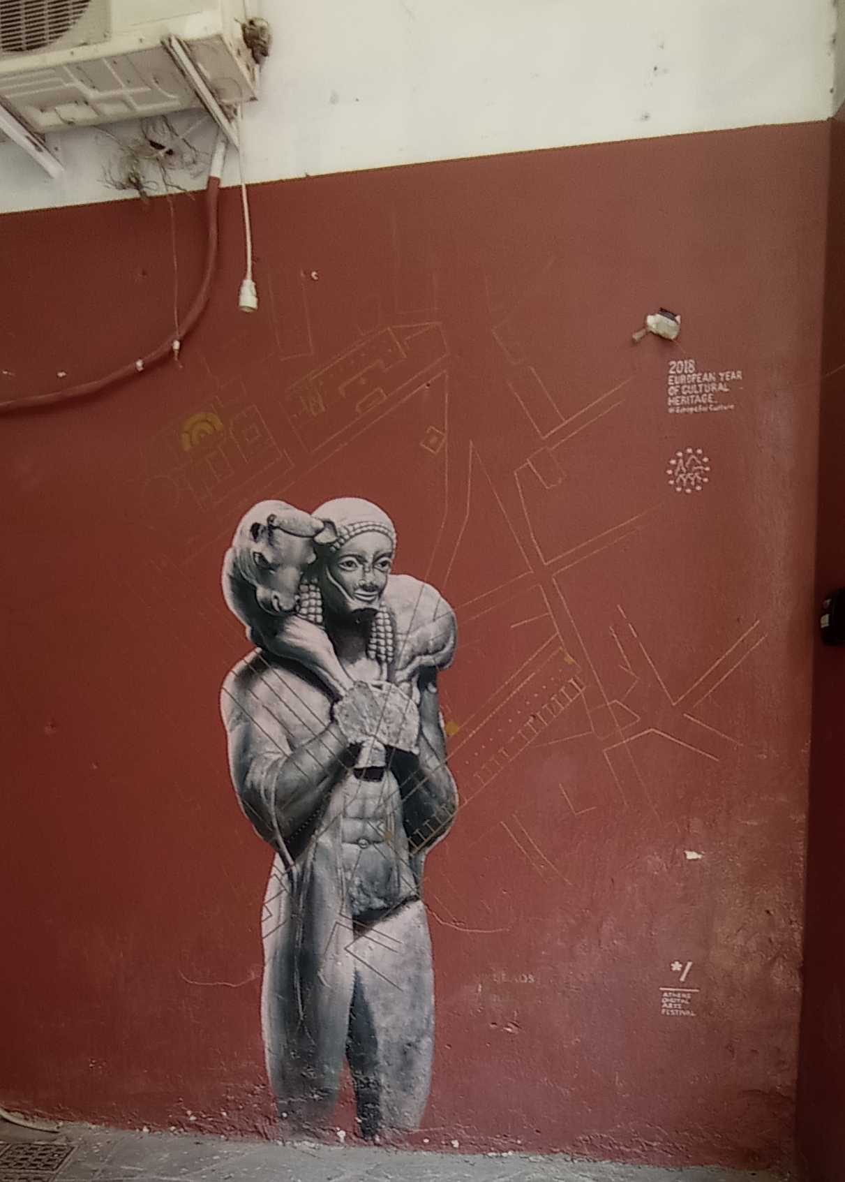Ancient Figure Stencil on Red Wall — Street art in Athina