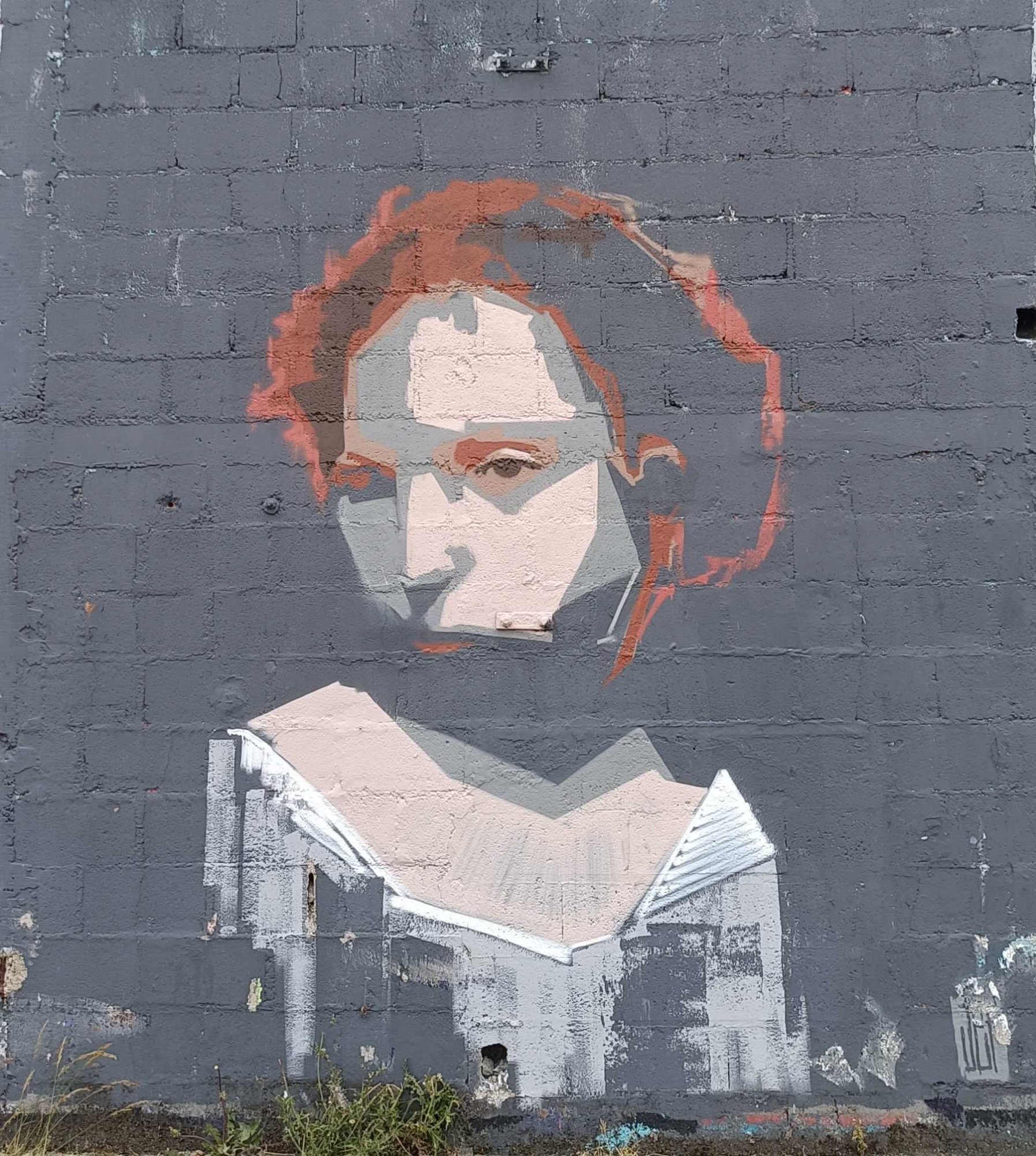 Portrait féminin aux cheveux roux — Street art à Redon