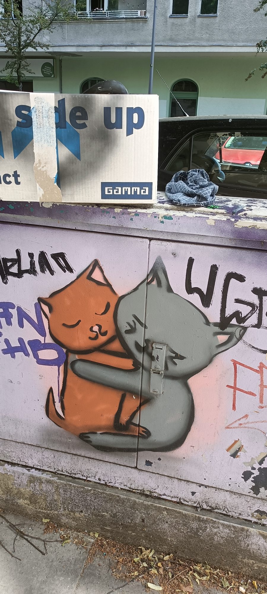Hugging Cats on the Power Box — Street art in Berlin