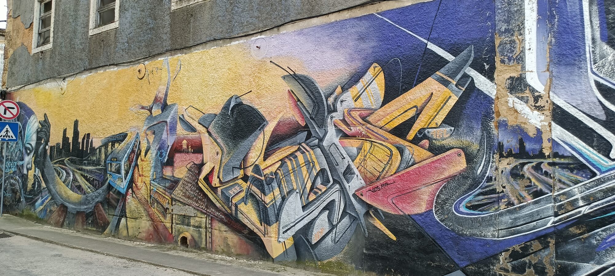 Lisbon Tram and Yellow Lettering by Vespa — Street art by Vespa in Almada