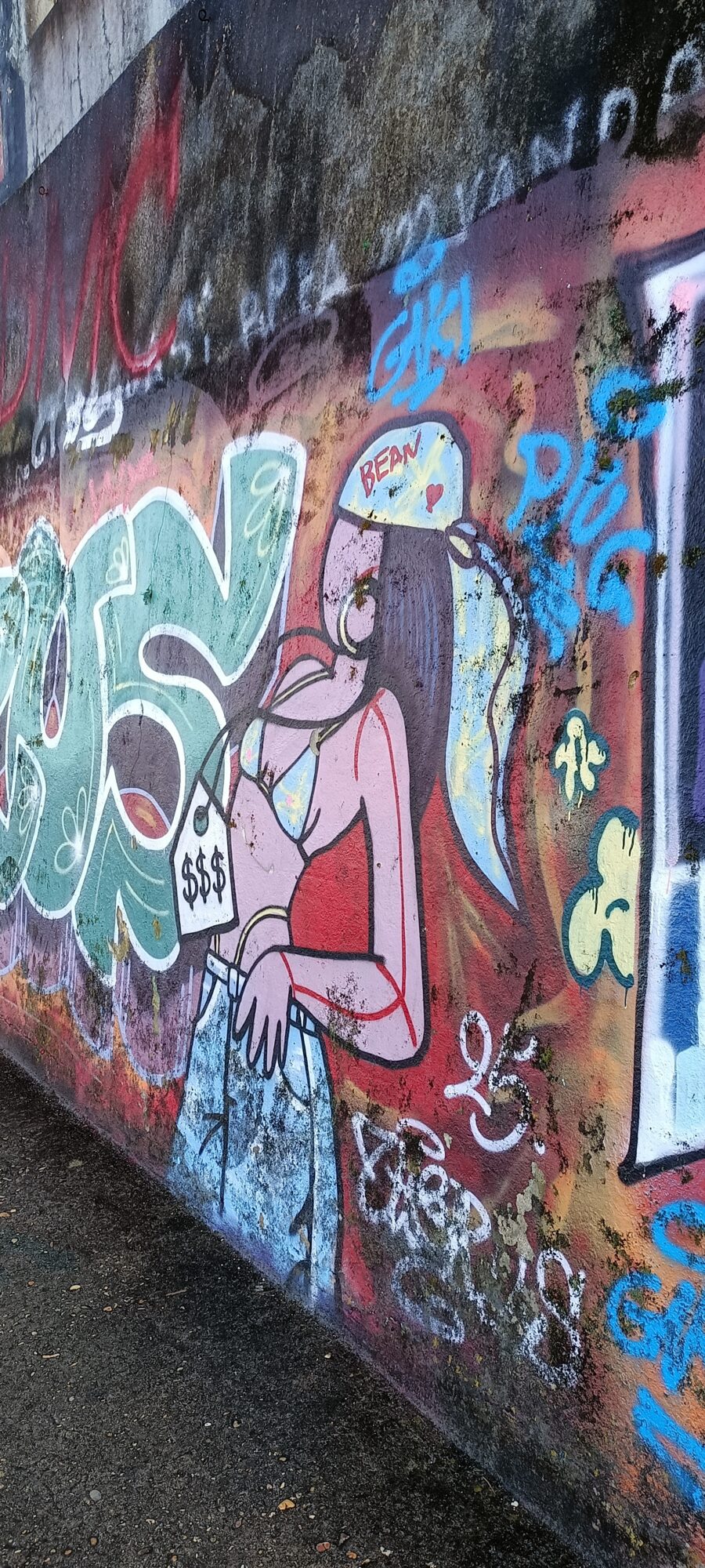 Woman with Bean Headband and Dollar Tag — Street art in Lisboa