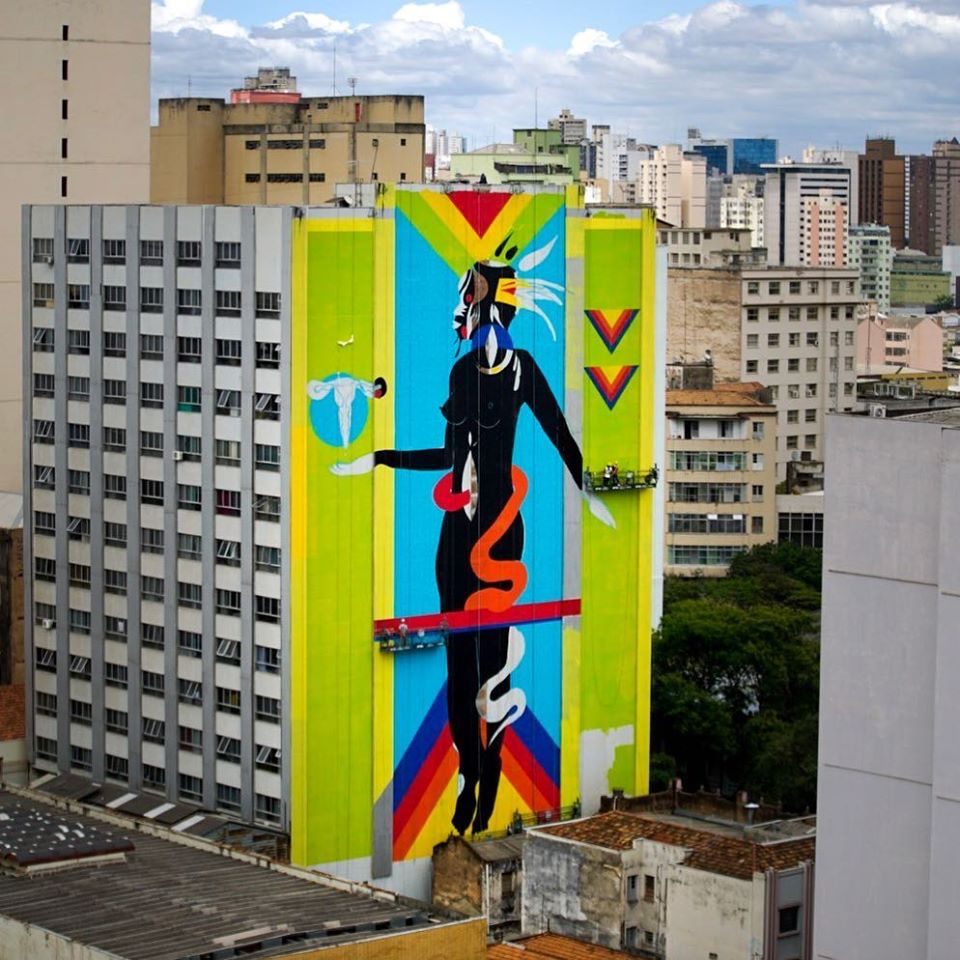 Híbrida Astral – Guardiã Brasileira — Street art by Criola in Belo Horizonte