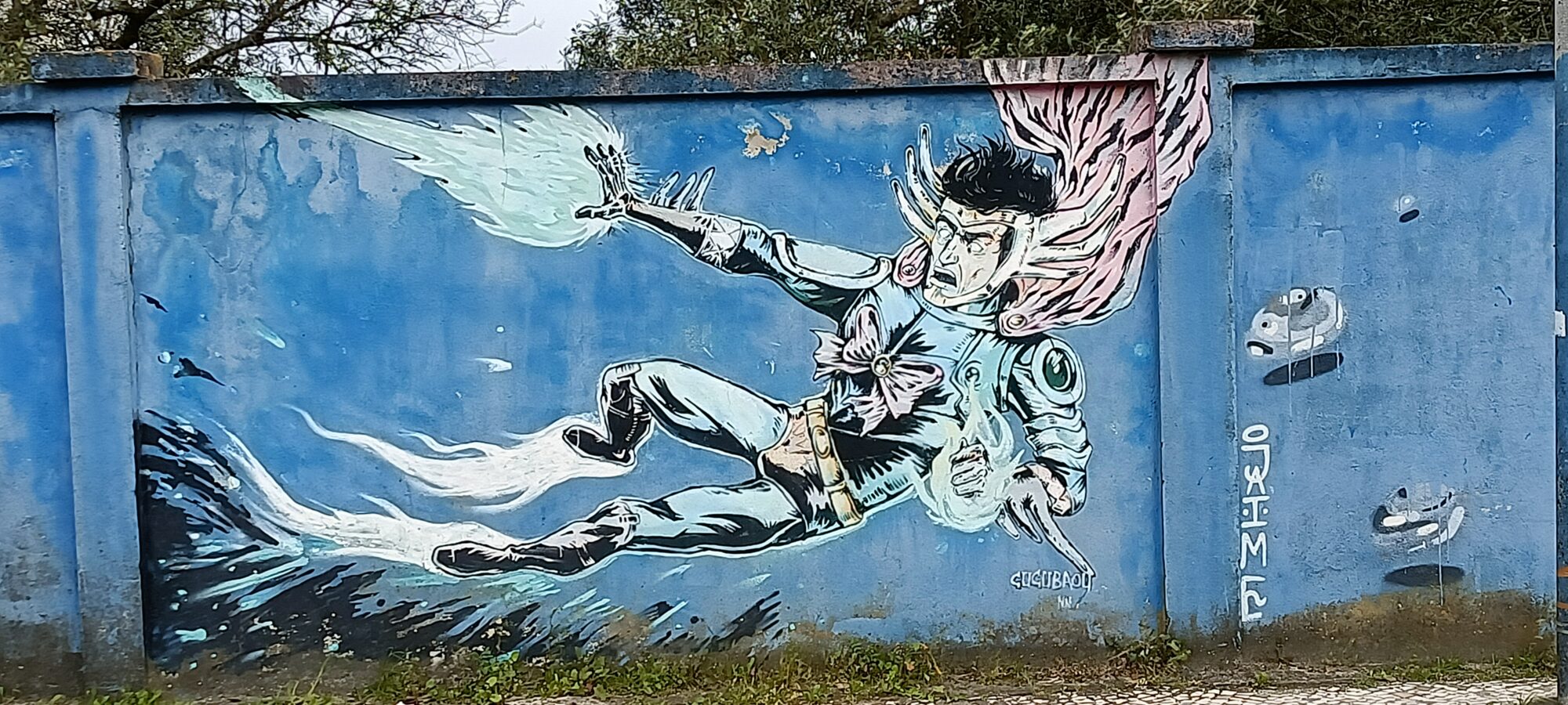 Manga hero in mid-flight — Street art in Lisboa