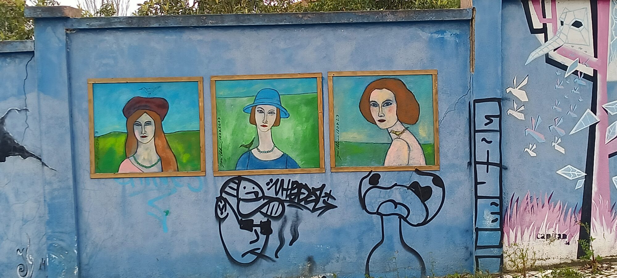 Three hatted portraits and scribbles — Street art in Lisboa