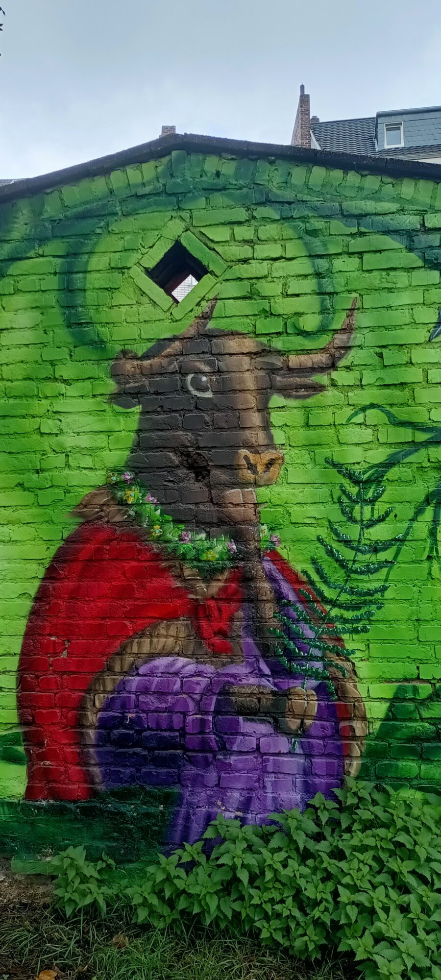 Bull with a garland of flowers — Street art by Colorrevolution e.V. in Köln
