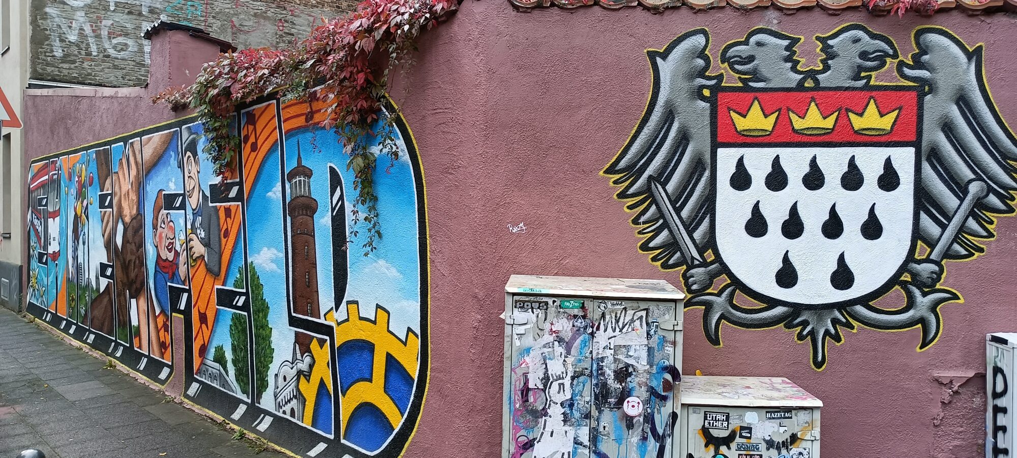 Cologne coat of arms and Ehrenfeld lettering — Street art in Köln