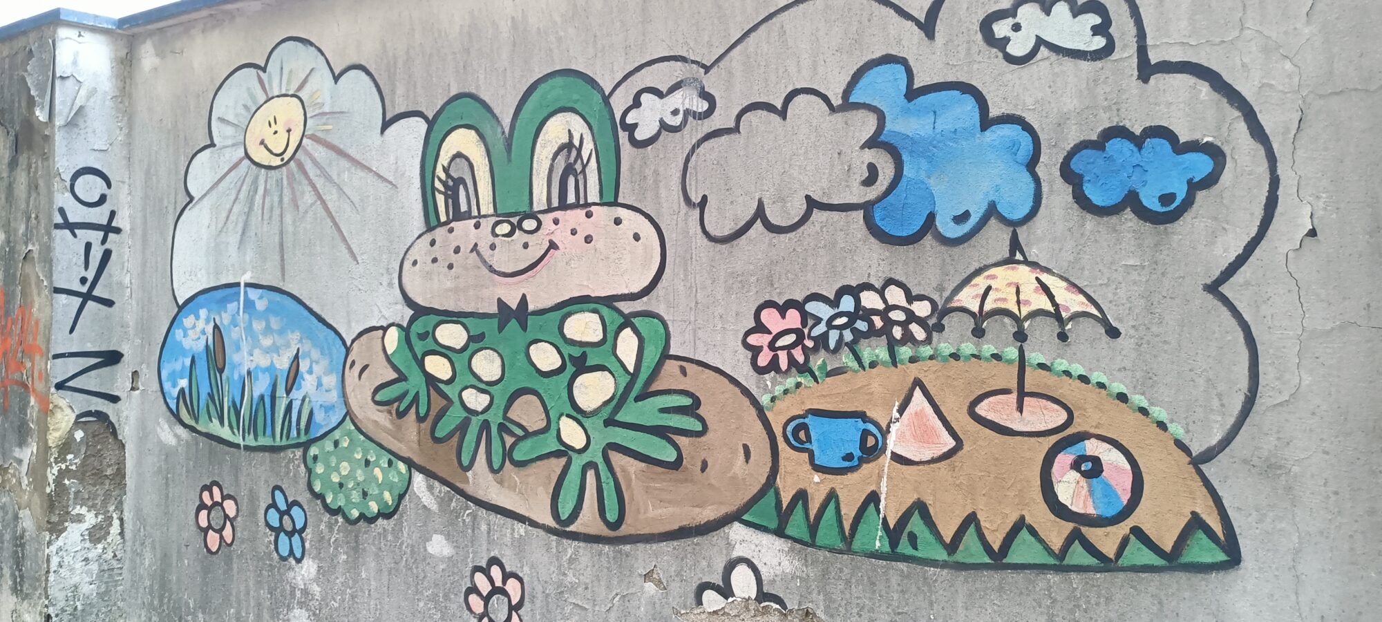 Grenouille verte et soleil — Street art à Düsseldorf
