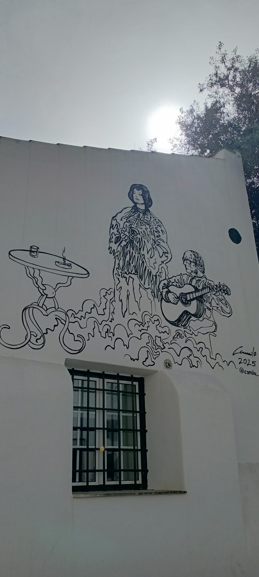 Fadiste et guitariste, par Camilo — Street art de Camilo à Lisboa