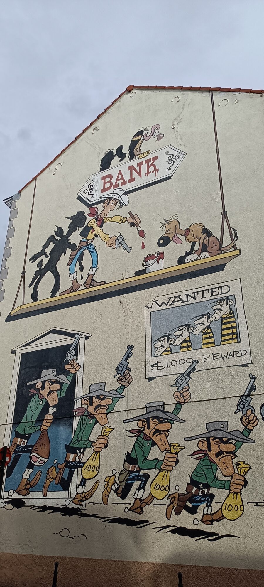 Lucky Luke et les Dalton par Morris — Street art de Morris à Bruxelles