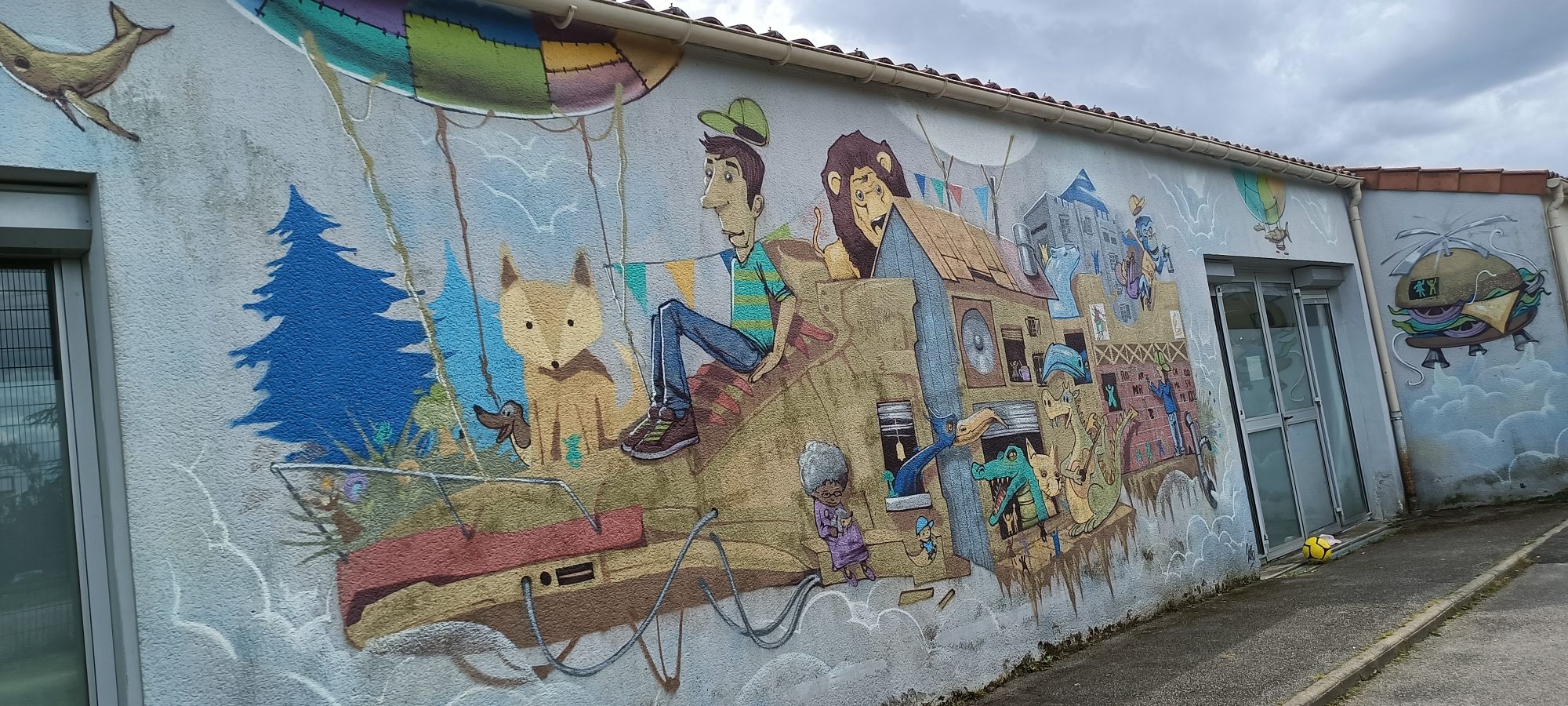A Child's Imaginary Flight — Street art in Rezé